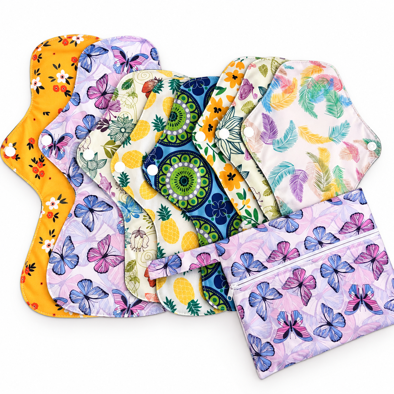 Reusable Cloth Pads and liners - set of 9 pads and a wet bag, made of organic cotton in bright prints.